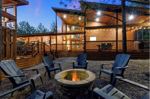 Enjoy evenings under the stars with a crackling fire, hot tub, and comfy outdoor furniture.