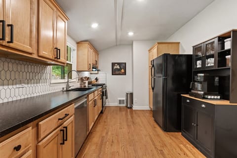 Galley kitchen with ample counter space and a coffee nook