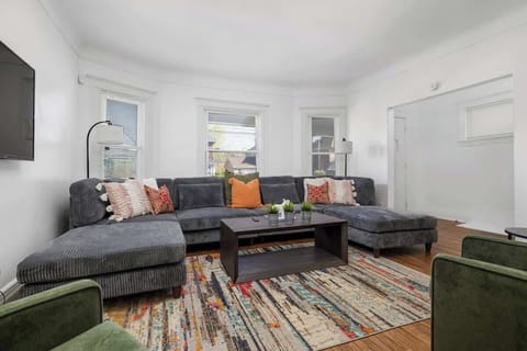 Alternate view of the cozy sectional lounge area.