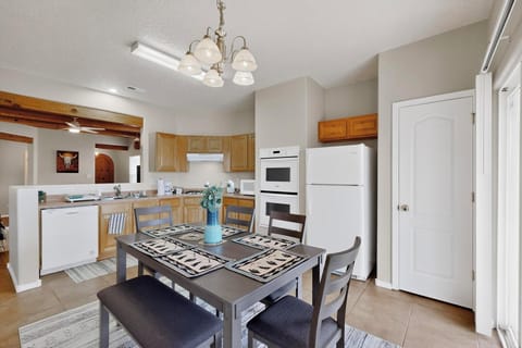 Cook in the fully equipped kitchen and gather around the spacious dining table.
