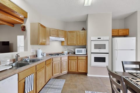 Kitchen ready for your culinary adventures, fully equipped for easy cooking.