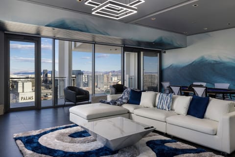 A stylish and comfortable living area with direct access to the balcony,
