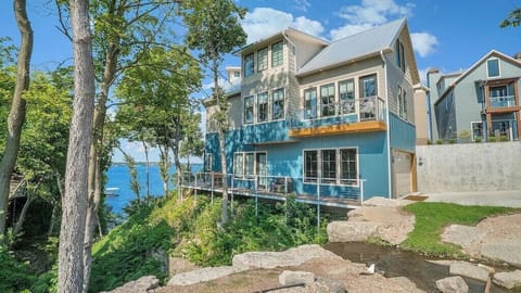 Modern Concept Construction allows for breathtaking views of both lake and waterfall.