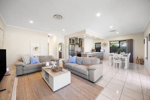 Enjoy easy, connected living across the open-plan space, where cooking, dining and relaxing flow seamlessly together.