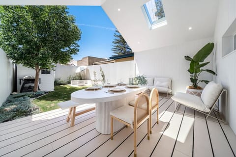 A spacious deck provides ample room for outdoor entertaining.