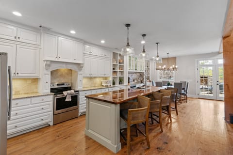 Enjoy a large, updated kitchen featuring modern appliances, ample counter space, and everything you need for cooking and entertaining.