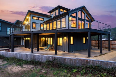 Enjoy incredible twilight moments from your spacious, wraparound balcony with cable railing, offering uninterrupted views.