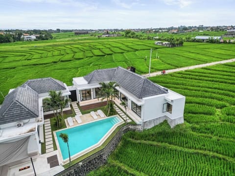 Retreat to Villa Luwa’s outdoor paradise.#Villa Luwa