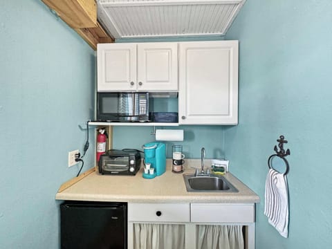 Enjoy your own space—full kitchenette in the first-floor queen suite. 