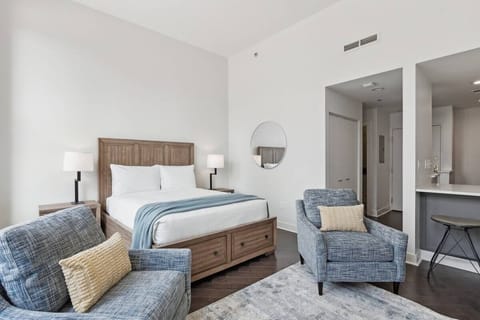 Settle in with open-concept comfort, plush seating, and serene style.