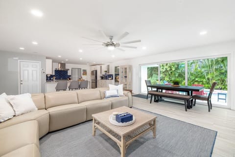 Sunlight fills this cozy lounge space designed for connection and relaxation