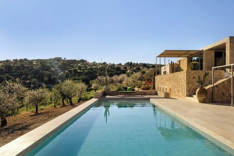 Mandorla's pool with the main house above.