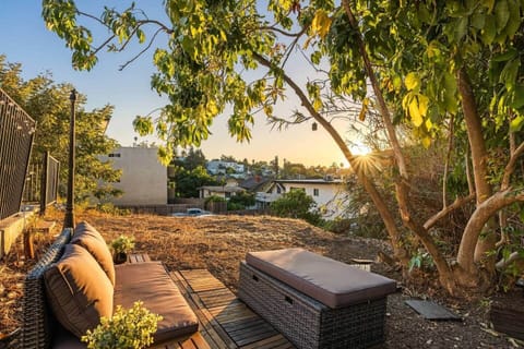 Unwind under the trees as the sun sets over Echo Park.