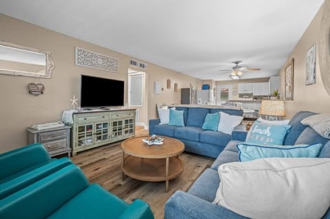 Living room with smart tv and 2 sofa beds