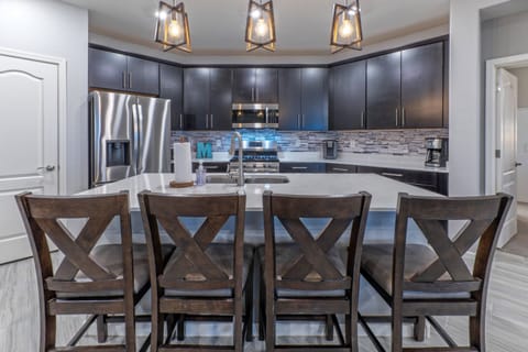 Island seating for coffee, nightcaps and snacks.