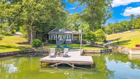 Waterfront retreat with private dock, spacious yard, and stunning lake views.
