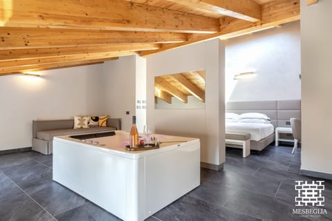 Suite, Jetted Tub | Premium bedding, down comforters, minibar, in-room safe