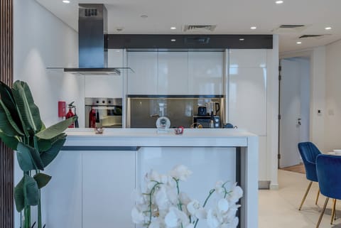 Deluxe Apartment, Balcony, Courtyard View | Private kitchen | Espresso maker, electric kettle