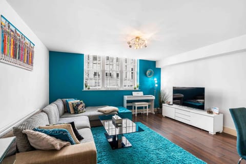 Spacious living room with Smart TV, sofa,