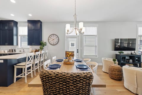 Tons of seating, table for meals, island for snacks and serving