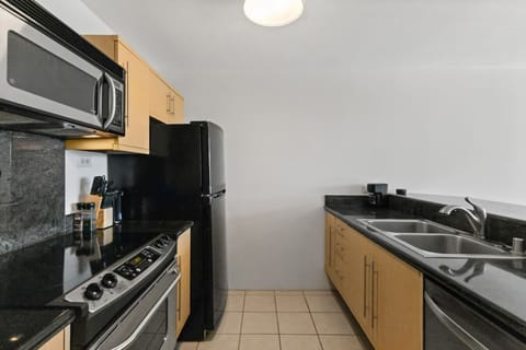 Everything you need, right where you need it in this sleek kitchen.