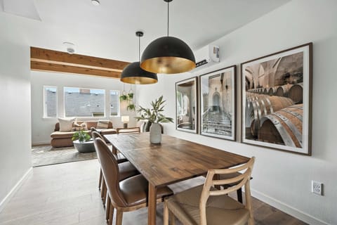 Dining room with table and living room beyond.