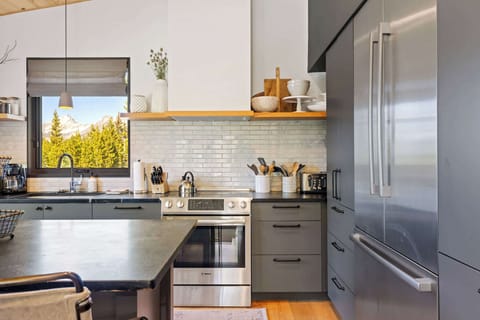 Kitchen: Drip coffee maker, Keurig, Crockpot, blender, waffle maker, food processor, cooking utensils, tableware