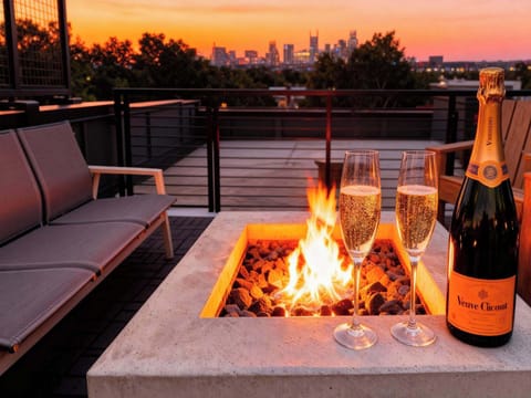 Unwind at this chic Nashville vacation home with breathtaking rooftop views! Enjoy evenings by the fire, sipping champagne as the city skyline illuminates your getaway. Perfect for any occasion, reserve your stay with Misfit Homes today!
