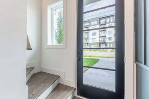 Step into modern luxury with this stunning entrance in one of Nashville's chic vacation homes. Perfect for friends and families alike, it's your gateway to unforgettable moments. Book now with Misfit Homes and make your Nashville getaway a reality!