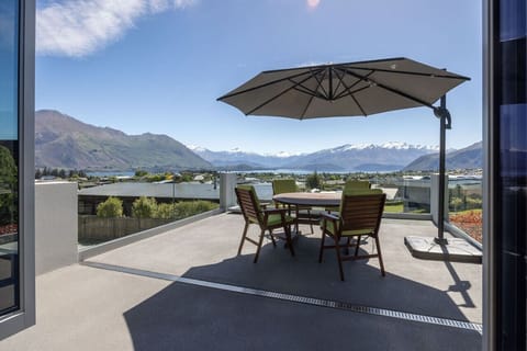 Enjoy the mountain and lake views from the balcony