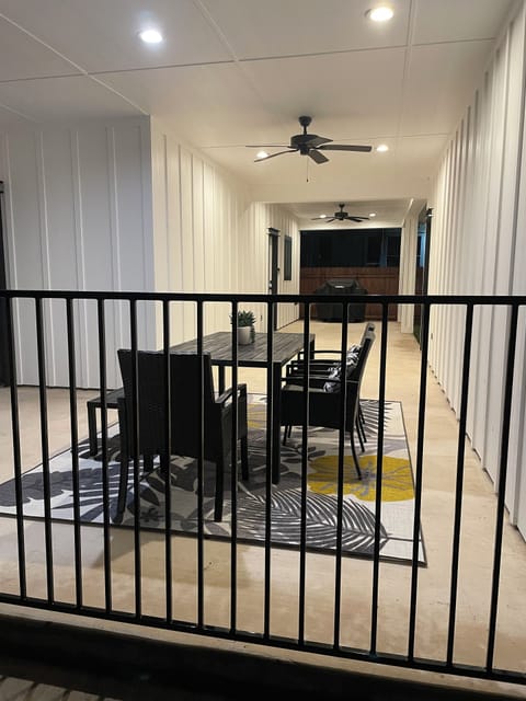 Beautiful breezeway to gather under the weather.