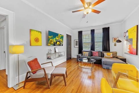 A cozy living area with soft lighting and an open layout that creates a comfortable place to relax or gather.