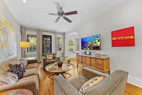 Bright, open living space with natural light, Smart TV, and free Wi-Fi just minutes from Uptown Charlotte.