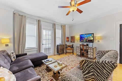Sink into the plush sectional for a cozy night in after a day of exploring the local neighborhood.