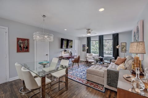 Well-lit lounge area near Uptown Charlotte designed for comfort, whether staying short or long-term.