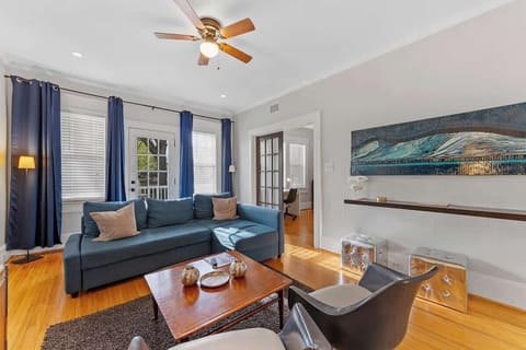 Sink into plush cushions for a cozy movie night or a quiet afternoon nap in this sun-drenched sanctuary.