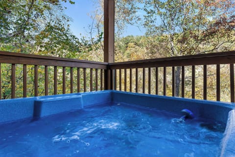 Relax in the bubbling hot tub beneath the stars