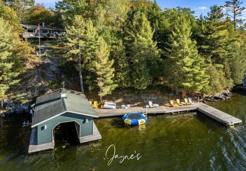 Lakeside dock and cozy boathouse for endless summer fun