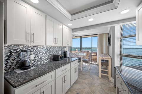 Kitchen with balcony and an Intracoastal view