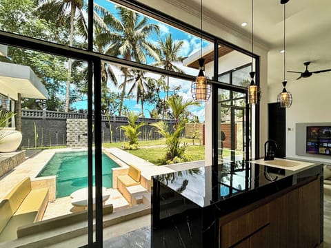 Two-Bedroom Villa | Private kitchen | Full-size fridge, microwave, stovetop, cookware/dishes/utensils