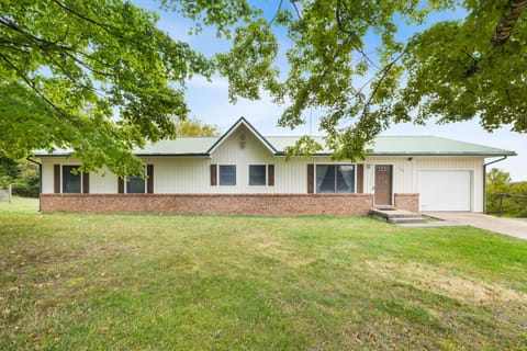 Inside, enjoy sleeping arrangements for 13, a fully stocked kitchen, our cozy living room, and a pool table!