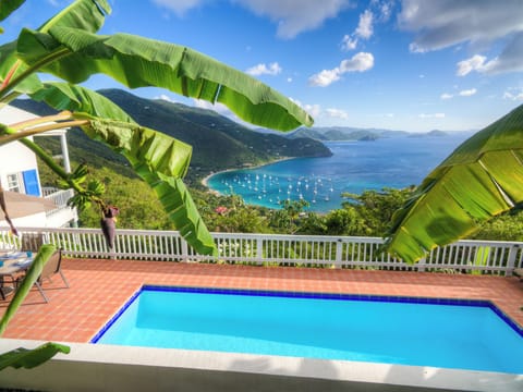 Makere sun terrace and pool looking down over Cane Garden Bay.