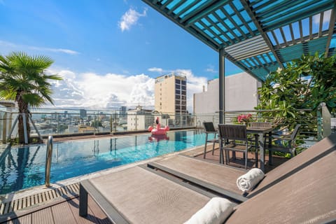 Outdoor pool, open 6:00 AM to 10:00 PM, sun loungers