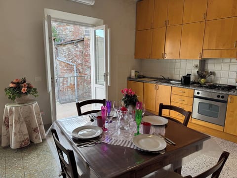 Furniture, Flooring, Wood, Interior Design, Kitchen & Dining Room Table, Dining Room, Floor, Table, Chair, Lighting