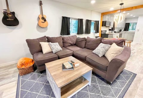 
Settle in for the soundtrack to your getaway. This open-plan space offers plush comfort and easy flow, perfect for strumming, snacking, and soaking it all in.