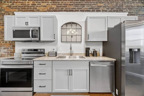 Enjoy cooking in this fully stocked kitchen.  Brand new deluxe appliances with all the "bells and whistles".  A 4' stainless steel food prep cart is available upon request.