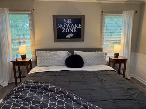 King bed master suite with double vanity and walk in shower and soaking tub.