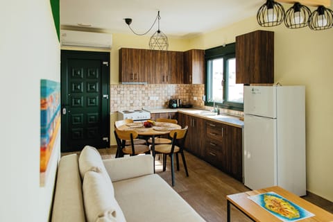 Deluxe House, 1 Bedroom, Kitchen, Sea View | Living area | Flat-screen TV