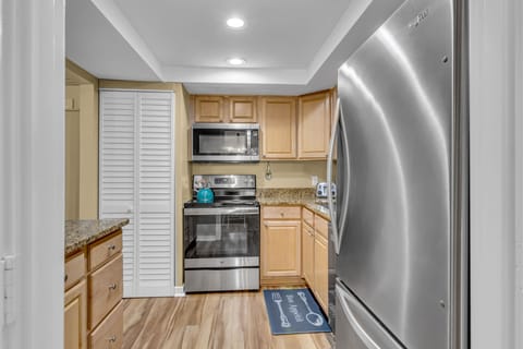 Your fully equipped kitchen invites culinary adventures with granite counters, stainless appliances, and everything needed for memorable meals.