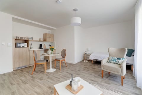 Studio, Balcony | Living area | 80-cm TV with digital channels